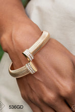 Load image into Gallery viewer, Paparazzi “Tailored Transit” Gold Cuff Bracelet - Paparazzi Accessories
