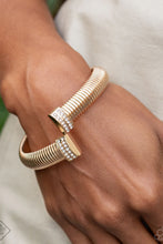 Load image into Gallery viewer, Paparazzi “Tailored Transit” Gold Cuff Bracelet - Paparazzi Accessories