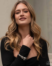 Load image into Gallery viewer, Paparazzi “Stunning Sculpture” Silver High Sheen Hinge Bracelet - Paparazzi Accessories