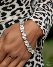 Load image into Gallery viewer, Paparazzi “Never-Ending Elite” White Adjustable Clasp Bracelet - Paparazzi Accessories
