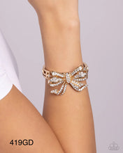 Load image into Gallery viewer, “Its All A-BOW-t Me” Gold Stretch Bracelet - Paparazzi
