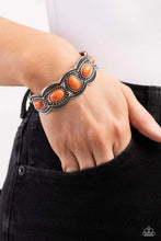 Load image into Gallery viewer, Paparazzi “World Traveler” Orange Cuff Bracelet
