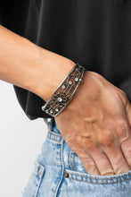 Load image into Gallery viewer, Paparazzi “Prairie Musical” White Hinge Bracelet - Paparazzi Accessories
