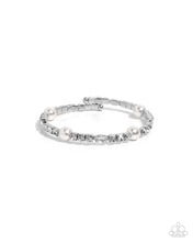 Load image into Gallery viewer, Paparazzi “Ladylike Leader” White Coil Cuff Bracelet - Paparazzi Accessories
