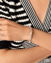 Load image into Gallery viewer, Paparazzi “Ladylike Leader” White Coil Cuff Bracelet - Paparazzi Accessories
