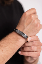 Load image into Gallery viewer, Paparazzi “Industrial Quest” Black Cuff Bracelet - Paparazzi Accessories
