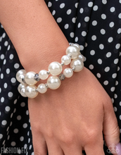 Load image into Gallery viewer, Paparazzi “Elegant Echo” White Stretcher Bracelet - Paparazzi Accessories

