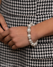 Load image into Gallery viewer, Paparazzi “Hypnotizing History” White Stretch Bracelet - Paparazzi Accessories
