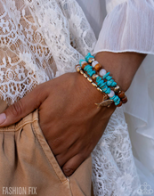 Load image into Gallery viewer, Paparazzi “Spirited Sequence” Gold  Coil Wrap Bracelet - Paparazzi Accessories
