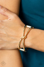 Load image into Gallery viewer, Paparazzi “KNOT My First Rodeo” Gold Hinged Bracelet
